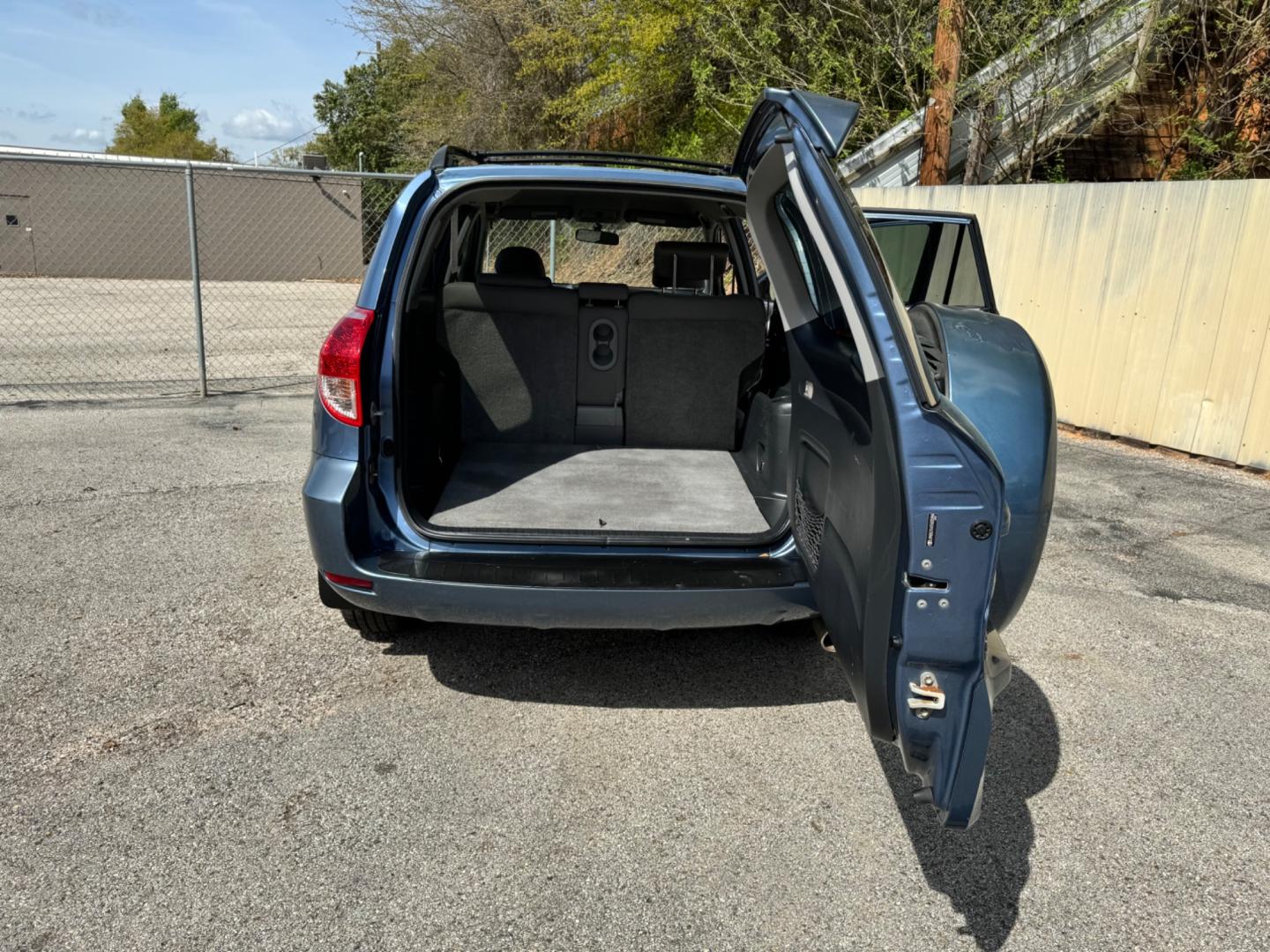 2007 BLUE Toyota RAV4 (JTMZK31V476) , located at 307 West Marshall Avenue, Longview, TX, 75601, (903) 753-3091, 32.500828, -94.742577 - HAIL DAMAGE - Photo#6